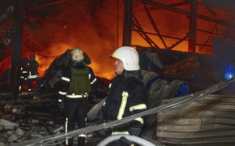 Firefighters near the site of a building damaged by a Russian attack in Odesa, Ukraine, Nov. 8, 2024.