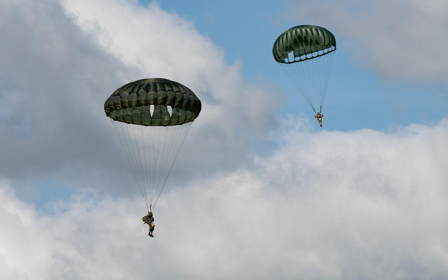 Hobby parachutists participate in a commemorative jump to mark the 80th anniversary of Operation Market Garden outside Eerde, Netherlands, on Tuesday, Sept. 17, 2024.