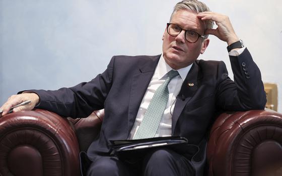 British Prime Minister Keir Starmer speaks to members of the media in Rome, Monday, Sept. 16, 2024. (Phil Noble/Pool Photo via AP)