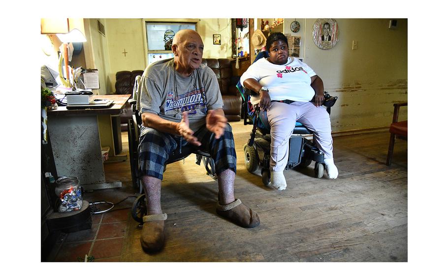 Disabled veteran Robert Henson and his daughter Robin Henson, who are both in wheelchairs, live in an Annapolis house that is need of repair.