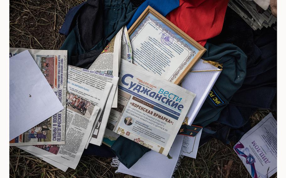 Items include Russian newspapers. 