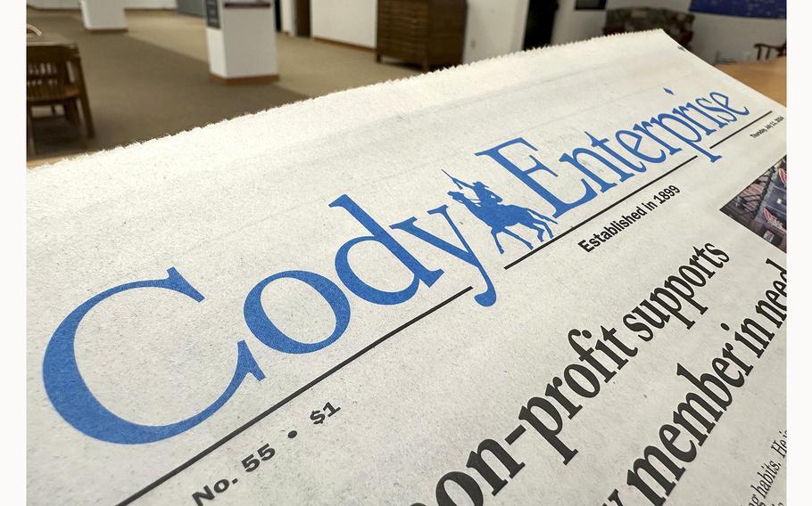 A recent issue of the Cody Enterprise, the Wyoming newspaper where a reporter used artificial intelligence to help write his stories, is seen Tuesday, Aug. 13, 2024, at the Wyoming State Library in Cheyenne.