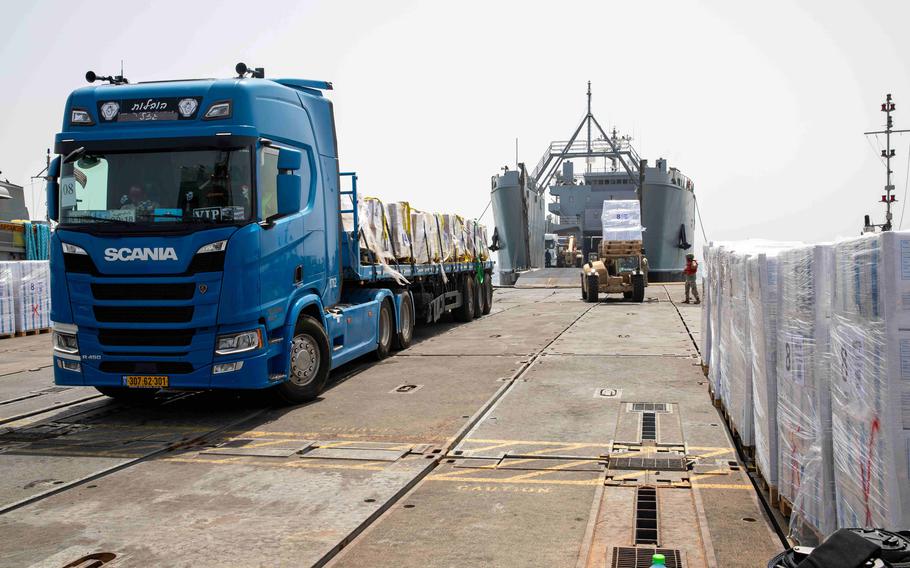 A truck transports humanitarian aid onto U.S. Army vessel in the Mediterranean Sea on May 20, 2024. 