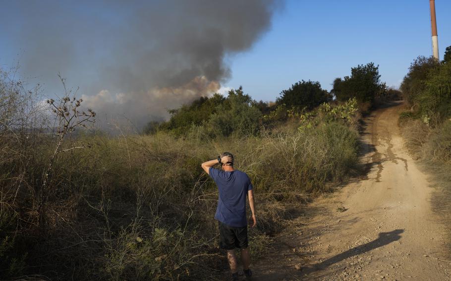 Smoke rises from a fire in central Israel after a missile strike