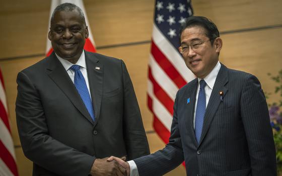 Secretary of Defense Lloyd J. Austin III greets Japanese Prime Minister ...