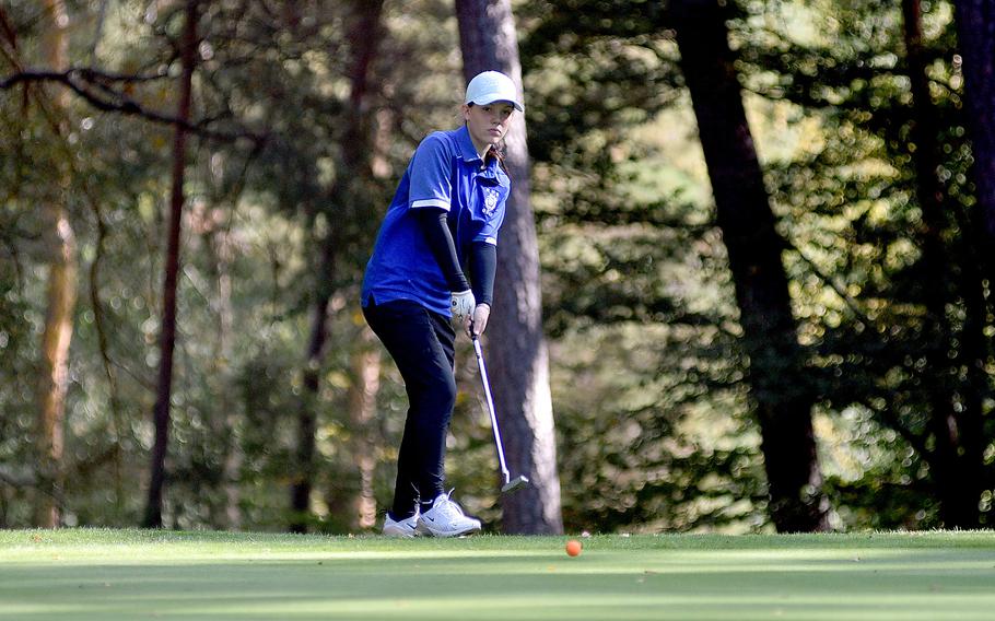 Ramstein freshman Nora Hacker putts on the 12th green of Woodlawn Golf Course on Ramstein Air Base, Germany, during the second day of the DODEA European golf championships on Oct. 13, 2023.