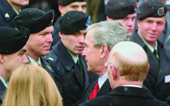 Mainz, Germany, Feb. 23, 2005: President Bush talks to American soldiers who served in Afghanistan during a military review upon his arrival in Mainz, Germany. 

META TAGS: Operation Freedom Sentinel; Afghanistan; Afghan Army; Wars on Terror