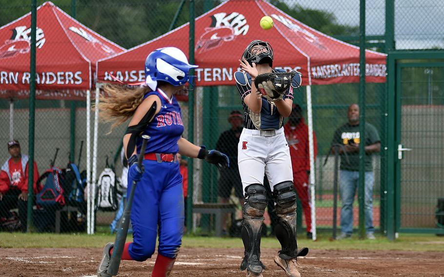 Kaiserslautern’s Alessia Garcia catches a foul ball from Ramstein’s Isabella Chambers during the Division I DODEA European softball championship game on May 24, 2024, at Kaiserslautern High School in Kaiserslautern, Germany.