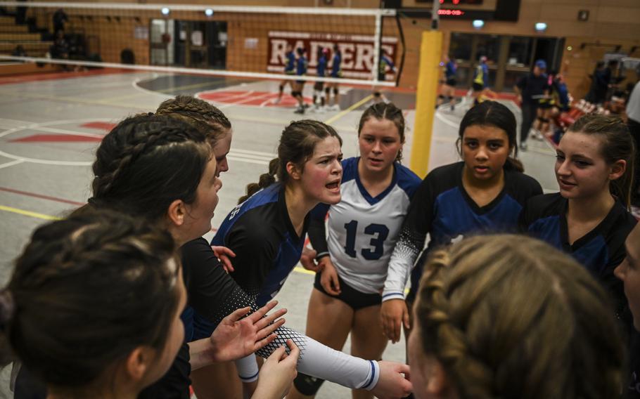 In a closely contested match, Brussels Brigand Patricia Rullan rallies her team with an uplifting cheer during a huddle against the Sigonella Jaguars at the DODEA Division III European volleyball semifinals on Oct. 27, 2023, in Kaiserslautern, Germany.