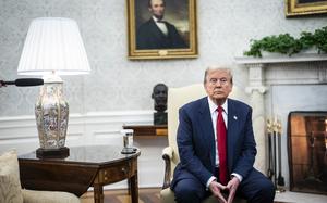 President-elect Donald Trump sits in the Oval Office during a November meeting with President Joe Biden. MUST CREDIT: Jabin Botsford/The Washington Post