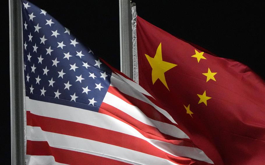 The American and Chinese flags wave at Genting Snow Park in Zhangjiakou, China.