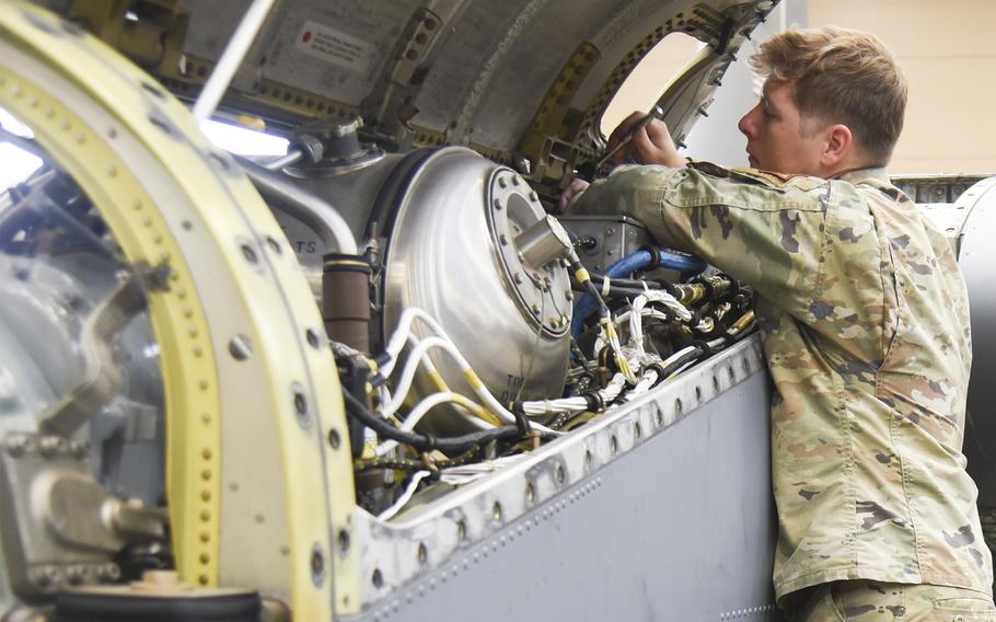Airman Dalton Poole performs a maintenance inspection on a C-130J Super Hercules engine in Hangar 15 at Yokota Air Base, Japan, on June 21, 2024.