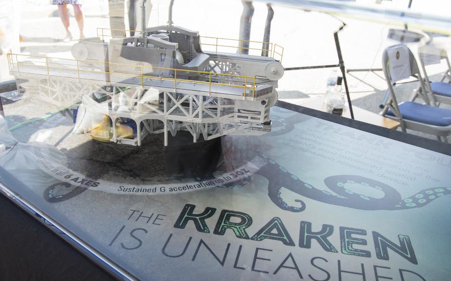 A model of the disorientation research device nicknamed “The Kraken” is displayed at the dedication ceremony for the Captain Ashton Graybiel Acceleration Research Facility at Naval Medical Research Unit Dayton, June 17, 2016, on Wright-Patterson Air Force Base, Ohio. The “Kraken,” or the the GL-6000 Disorientation Research Device, creates realistic motion simulations and has been described as a “spacial disorientation device.” It’s essentially a human-rated centrifuge.