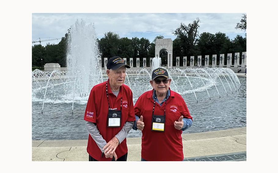 World War II veteran Evan Schmidt, left, visits the World War II Memorial in Washington, D.C., on May 24, 2024.