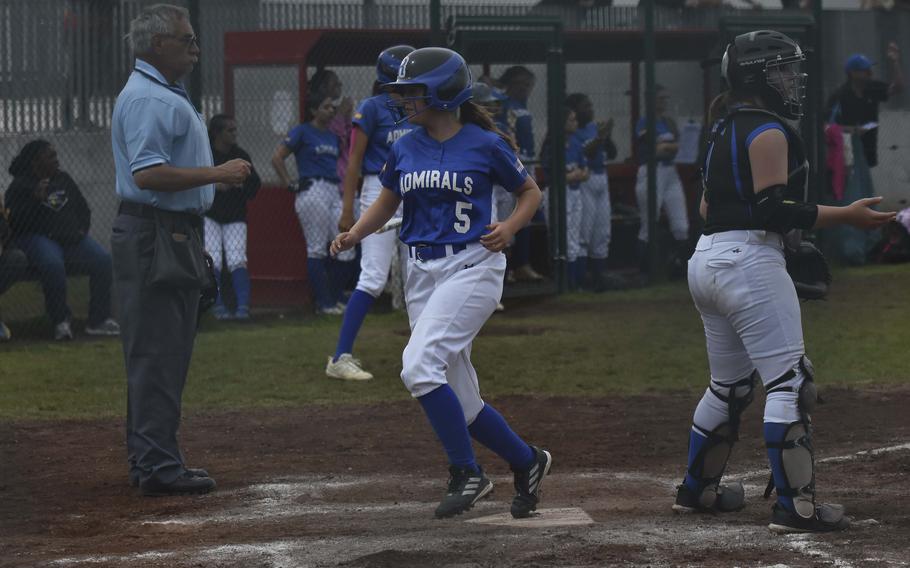 Rota freshman Rachel Orlowski crosses home plate for a score against Hohenfels during day two of the DODEA-Europe softball championships on May 23, 2024, in Kaiserslautern, Germany.