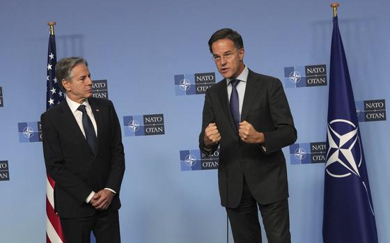 NATO Secretary General Mark Rutte, right, delivers a statement with United States Secretary of State Antony Blinken prior to a meeting at NATO headquarters in Brussels on Wednesday, Nov. 13, 2024. (AP Photo/Virginia Mayo)