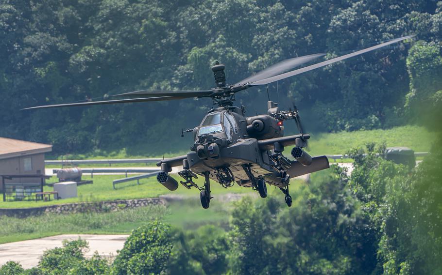 An AH-64E Apache assigned to the 4th Attack Reconnaissance Battalion returns to base after conducting a combined arms rehearsal at Rodriguez Live-Fire Complex, South Korea, on Aug. 9, 2024. Poland has signed a deal to purchase 96 of the helicopters.