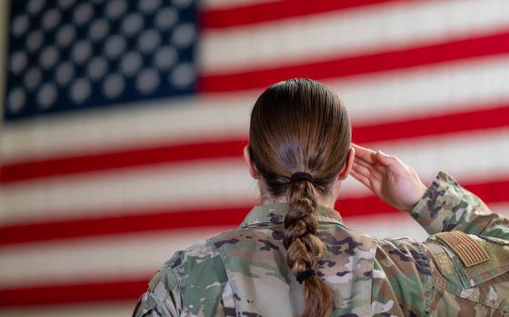 Senior Airman Tamarra Crowe, 66th Force Support Squadron career development technician, renders a salute at Hanscom Air Force Base, Mass., March 1. (U.S. Air Force photo by Mark Herlihy)