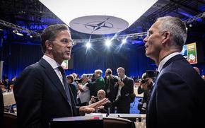Mark Rutte, left, as Dutch prime minister, talks with NATO Secretary-General Jens Stoltenberg at the NATO summit in Vilnius, Lithuania, in July 2023. Rutte was recently appointed by NATO to replace Stoltenberg as secretary-general.