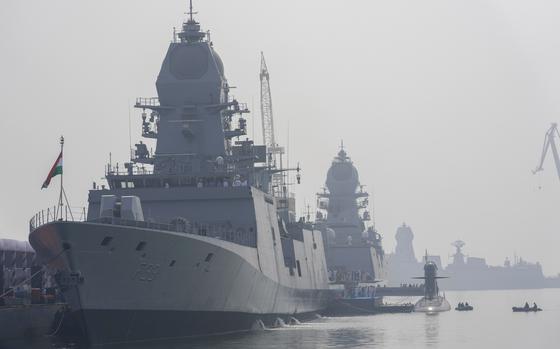 INS Nilgiri, left, along with Submarine Vaghsheer, right, and INS Surat during their commissioning ceremony at a naval dockyard in Mumbai, India, Wednesday, Jan. 15, 2025. 