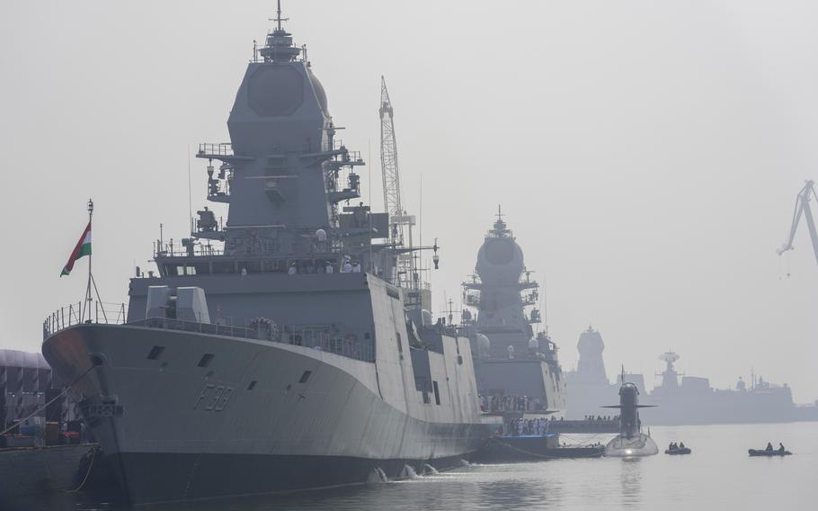 An Indian submarine, a destroyer and a frigate are shown. 