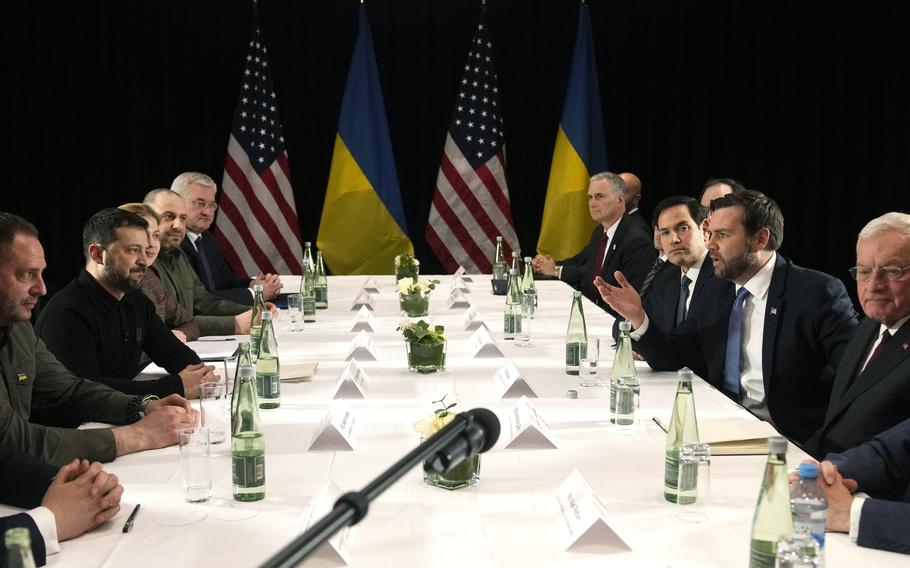 United States Vice-President JD Vance, second right, meets with Ukraine’s President Volodymyr Zelenskyy, second left, during a bilateral meeting on the sidelines of the Munich Security Conference in Munich, Germany,.