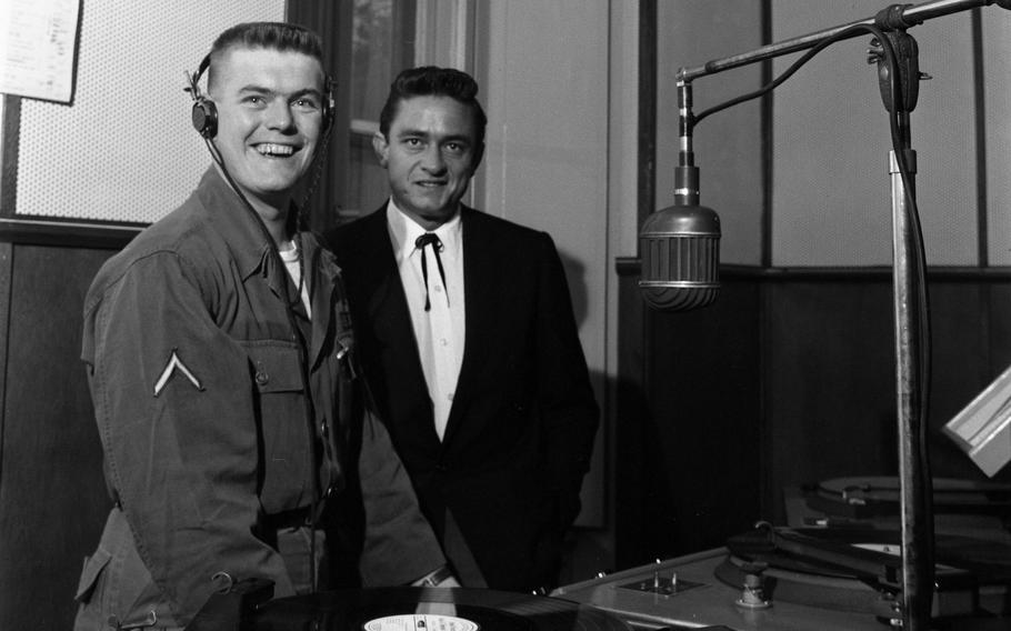 Johhny Cash visits the AFN radio studio in Frankfurt, Germany. The singer took over as guest disc jockey on AFN’s Hillbilly Reveille on Sept. 25, 1959. The morning show was the singer’s favorite when he was stationed in Landsberg for three years.