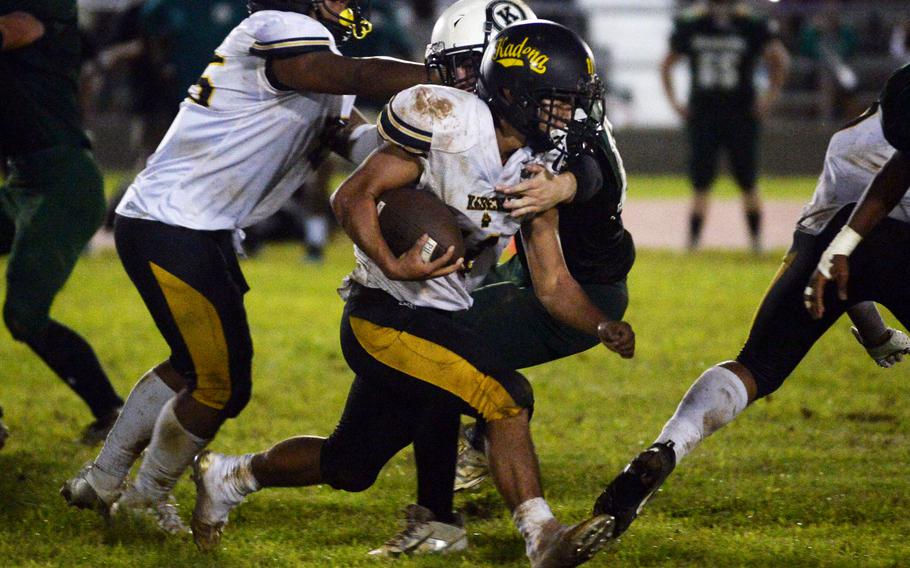 Hajime Reed runs with the ball.