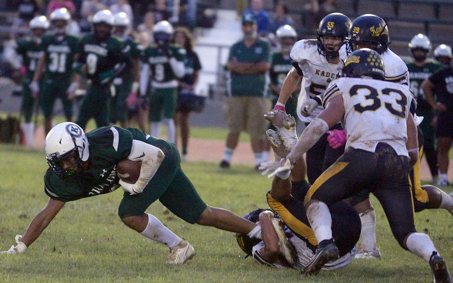 Tre Johnson runs with the football.