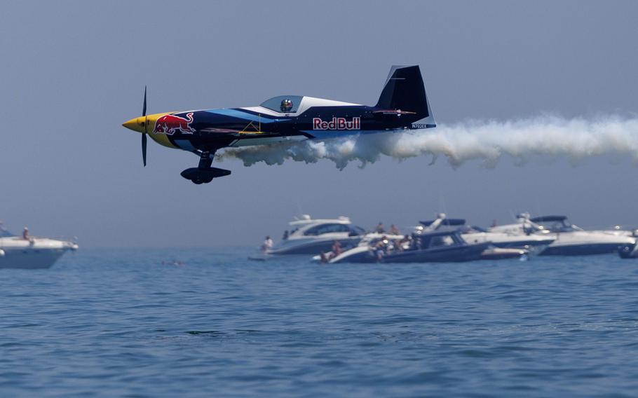 A plane flies over Lake Michigan during the Chicago Air and Water Show near North Avenue Beach in Chicago on Aug. 20, 2023.