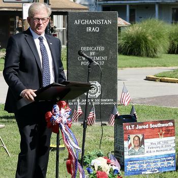 State Rep. Chris Miller speaks during a ceremony on July 6, 2024, to name a section of State Highway 133 through Oakland, Ill., the 1st Lt. Jared W. Southworth Highway.