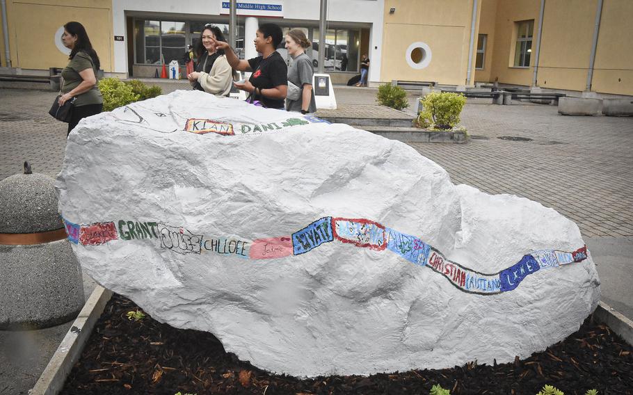 Carrying on a tradition, the senior class at Aviano High School made the large rock that sits in front of the school their own, writing their names on it before the start of classes Aug. 19, 2024.