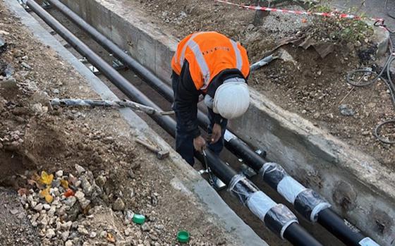 A contractor lays new steam pipes at Caserma Ederle in Vicenza, Italy, on Nov. 22, 2024. The project is expected to be completed in April 2025.