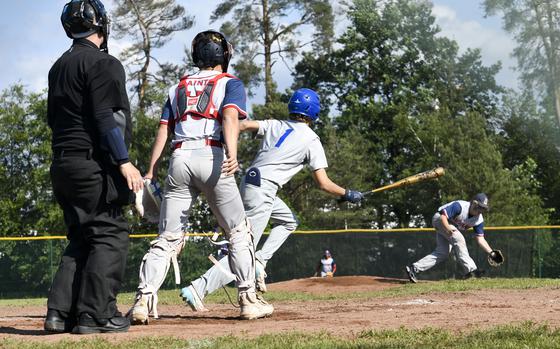 Hohenfels's Cully Jordan races toward first after hitting a ball toward the pitcher in a game in Ramstein Air Base, Germany, during the first day of the 2024 DODEA European baseball championships.