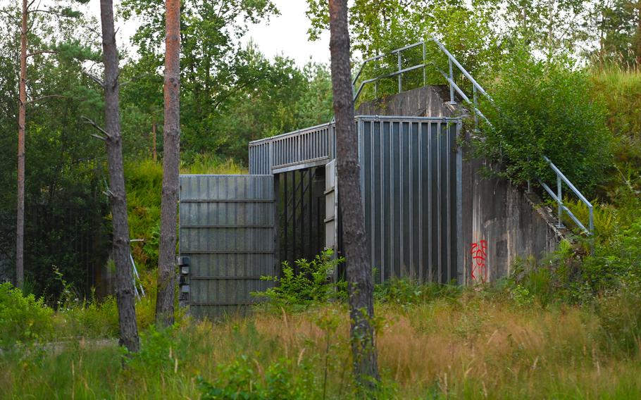 A reinforced bunker door with its cage still intact in the former Area 1 near Ludwigswinkel, Germany. These doors once secured the entry to bunkers storing nuclear weapons during the Cold War.