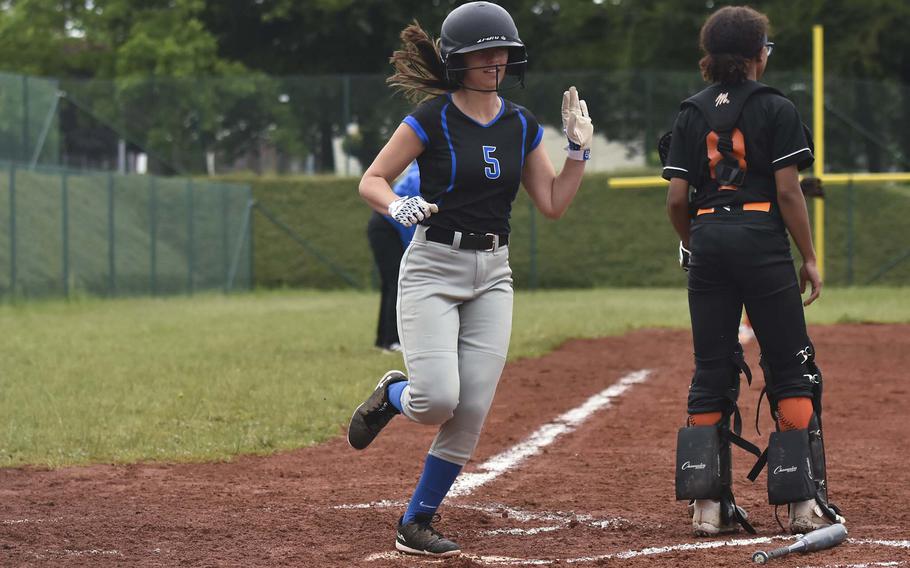 Hohenfels junior Zofia Hefflefinger scores a run against Spangdahlem during the European championships on May 22, 2024, at Ramstein Air Base, Germany. Hohenfels won the game 18-6.
