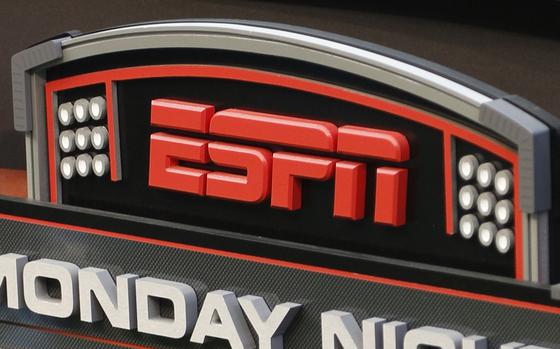 The ESPN logo is seen, Sept. 16, 2013, prior to an NFL football game between the Cincinnati Bengals and the Pittsburgh Steelers in Cincinnati.