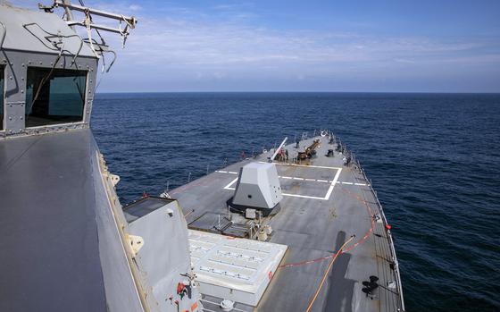 The guided-missile destroyer USS Ralph Johnson steams through the Taiwan Strait, Thursday, Aug. 22, 2024.