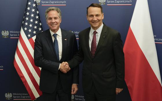 U.S. Secretary of State Antony Blinken, left, shakes hands with Polish Foreign Minister Radosław Sikorski in Warsaw on Sept. 12, 2024.