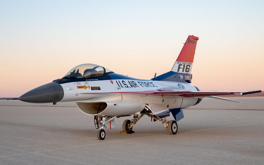 The F-16 Viper Demonstration Team aircraft sits on Rogers Dry Lake at Edwards Air Force Base, Calif., May 9, 2024. The new paint scheme pays homage to the YF-16 prototype that first flew at Edwards AFB in 1974.