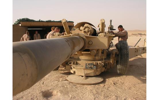 Combat Outpost Rawah, Iraq, July 21, 2007: Marines of 2nd Platoon, Battery R, 5th Battalion, 11th Marine Regiment, finish getting their M 198 155 mm howitzer into position for future fire missions. The platoon is part of Task Force Highlander, which operates in western Al Anbar province.

META TAGS: Operation Iraqi Freedom; USMC; U.S. Marine Corps; howitzer; War in Iraq; Wars on Terror