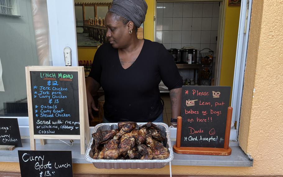 A person cooks Caribbean cuisine at a restaurant in Bavaria.