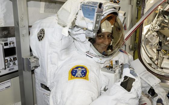 In this photo provided by NASA, astronaut Suni Williams tries on and evaluates her spacesuit aboard the International Space Station on Jan. 9, 2025. (NASA via AP)