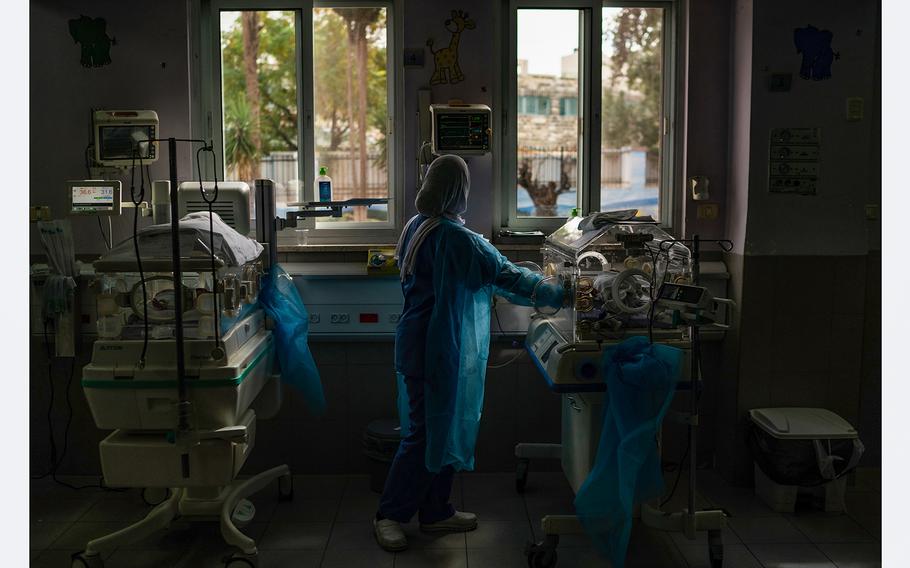 A nurse attends to a premature baby named Saaidah inside an incubator at a hospital in Israel on Wednesday. Saaidah's parents are in Gaza. 