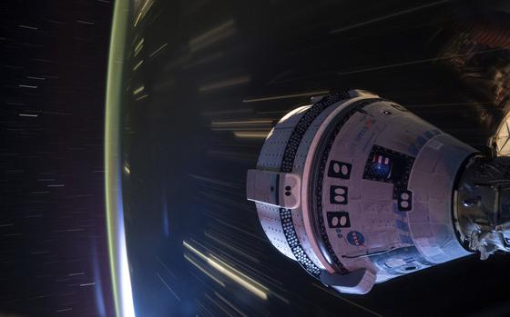 In this long-exposure photo provided by NASA, Boeing's Starliner spacecraft is docked to the Harmony module of the International Space Station on July 3, 2024. (NASA via AP)