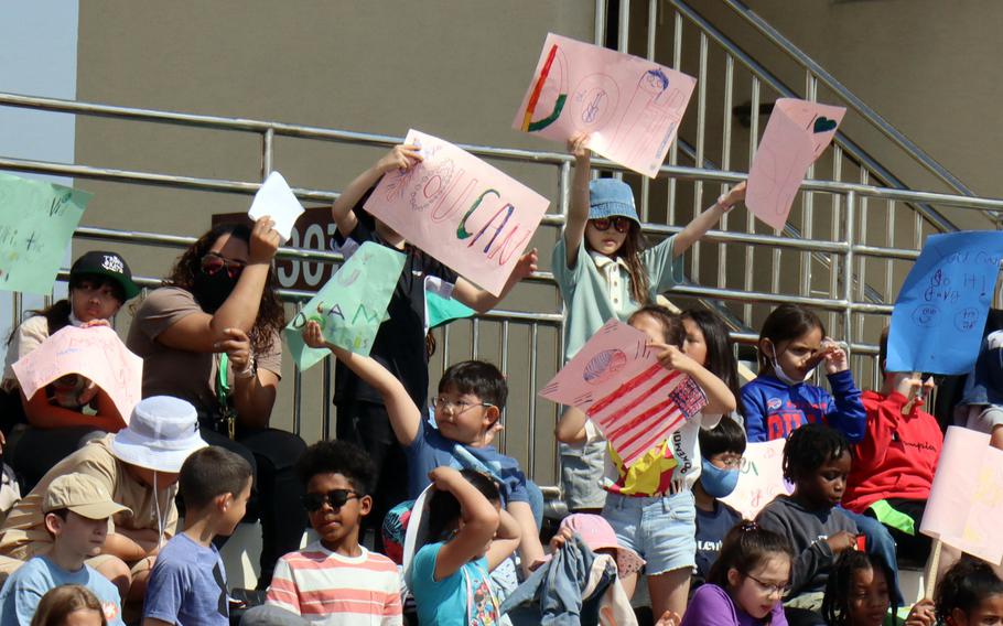 Students and teachers from Camp Humphreys’ schools cheer for kids competing in the Unified Special Olympics at Camp Humphreys, South Korea, May 3, 2023.