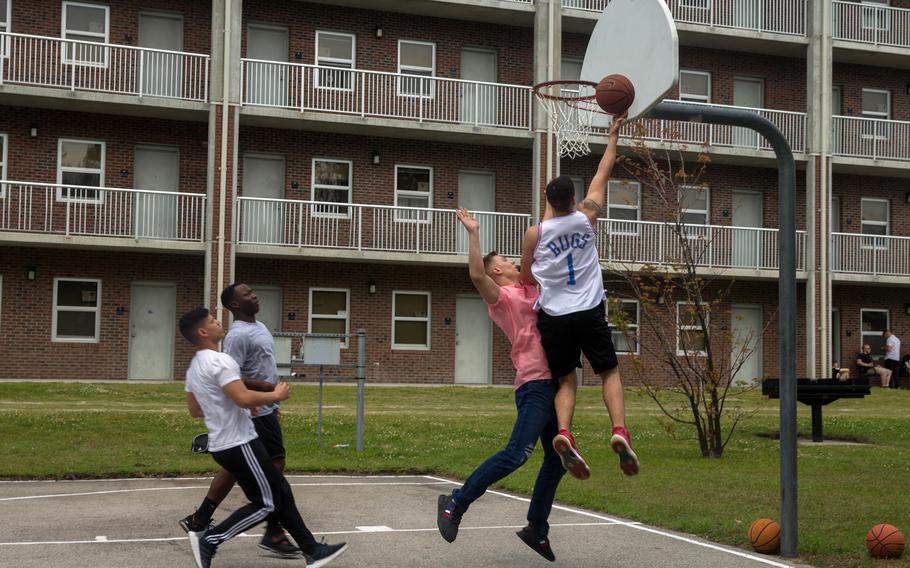 U.S. Marines play basketball during a barracks bash on Camp Lejeune, N.C., in 2019. Every Corps barracks will be inspected by mid-March, according to Gen. Christopher J. Mahoney, the assistant commandant of the Marine Corps.   