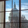 The U.S. Capitol building is seen through a window in the Senate Russell office building in Washington, D.C., on Thursday, Feb. 8, 2024.