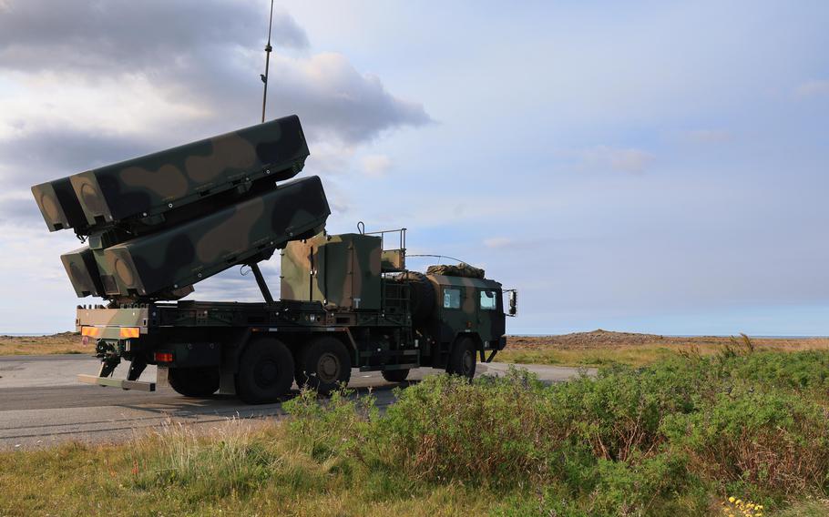 A Naval Strike Missile mobile launch vehicle is in raised firing position during an exercise in Iceland.