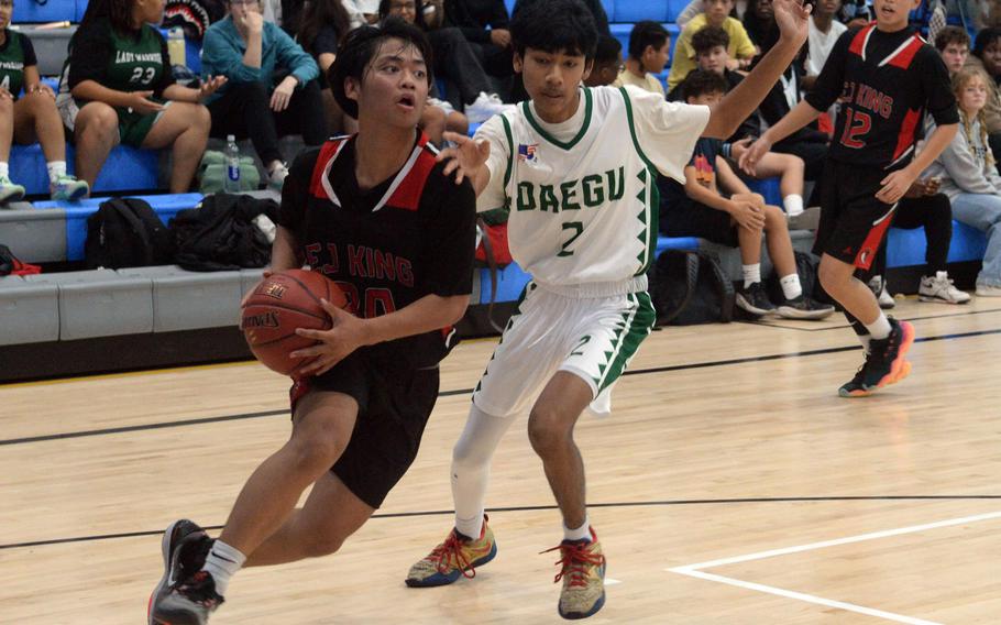 R.J. Tinioi drives to the basket.